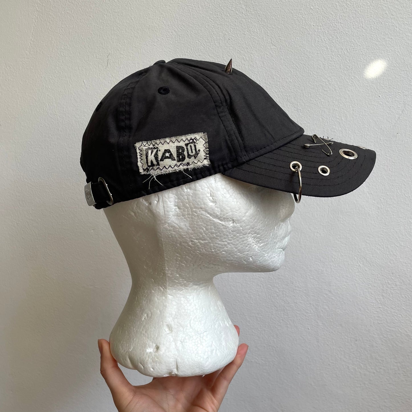 Grey eyelet cap