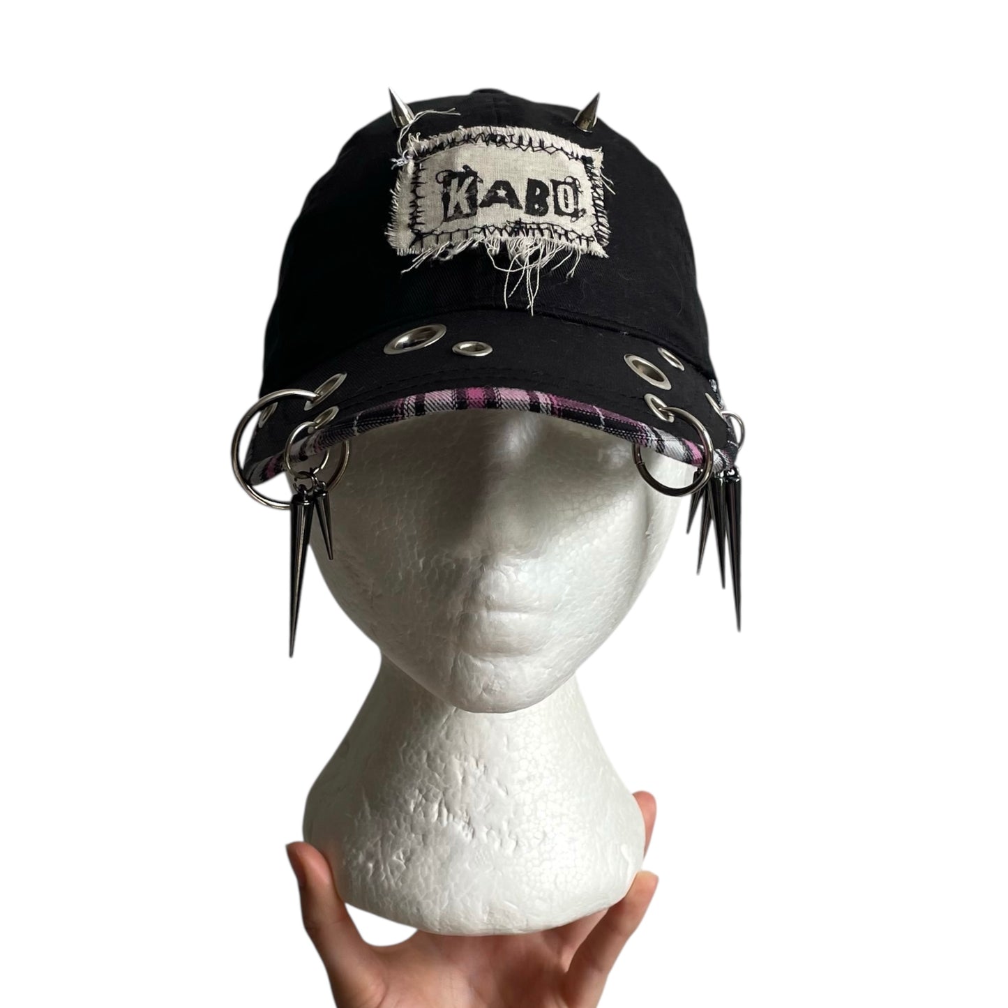 Spike charm cap