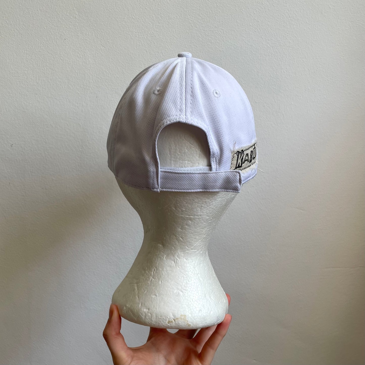 White eyelet cap