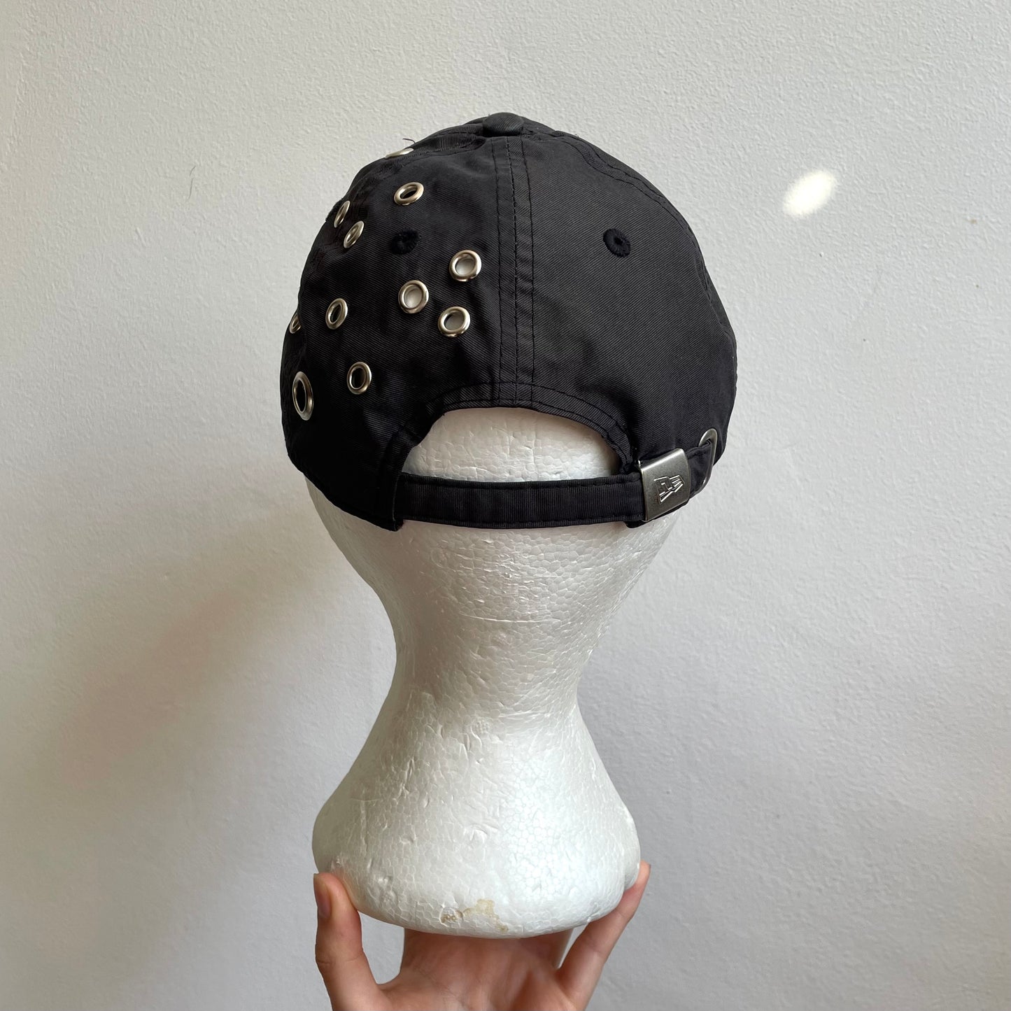 Grey eyelet cap