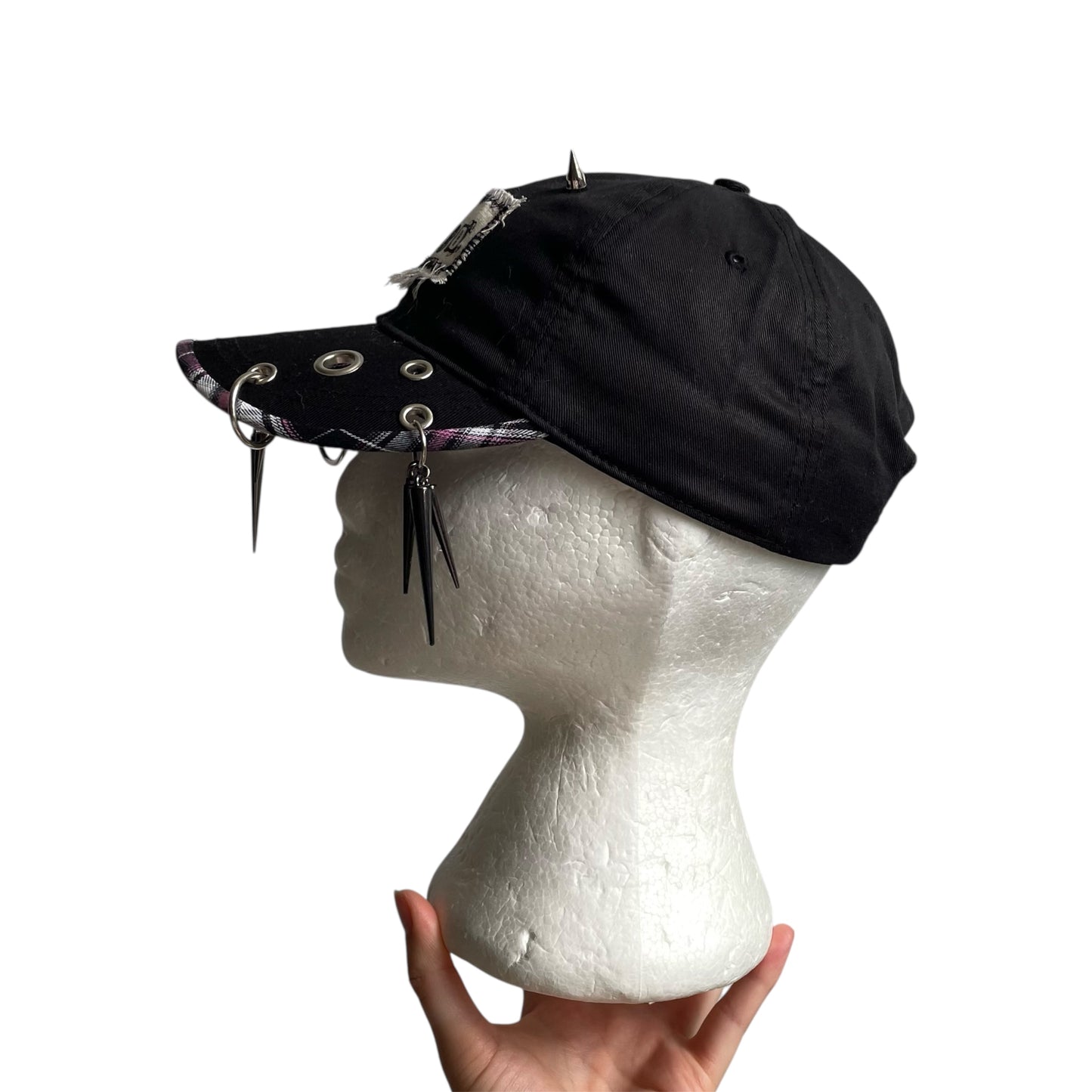 Spike charm cap