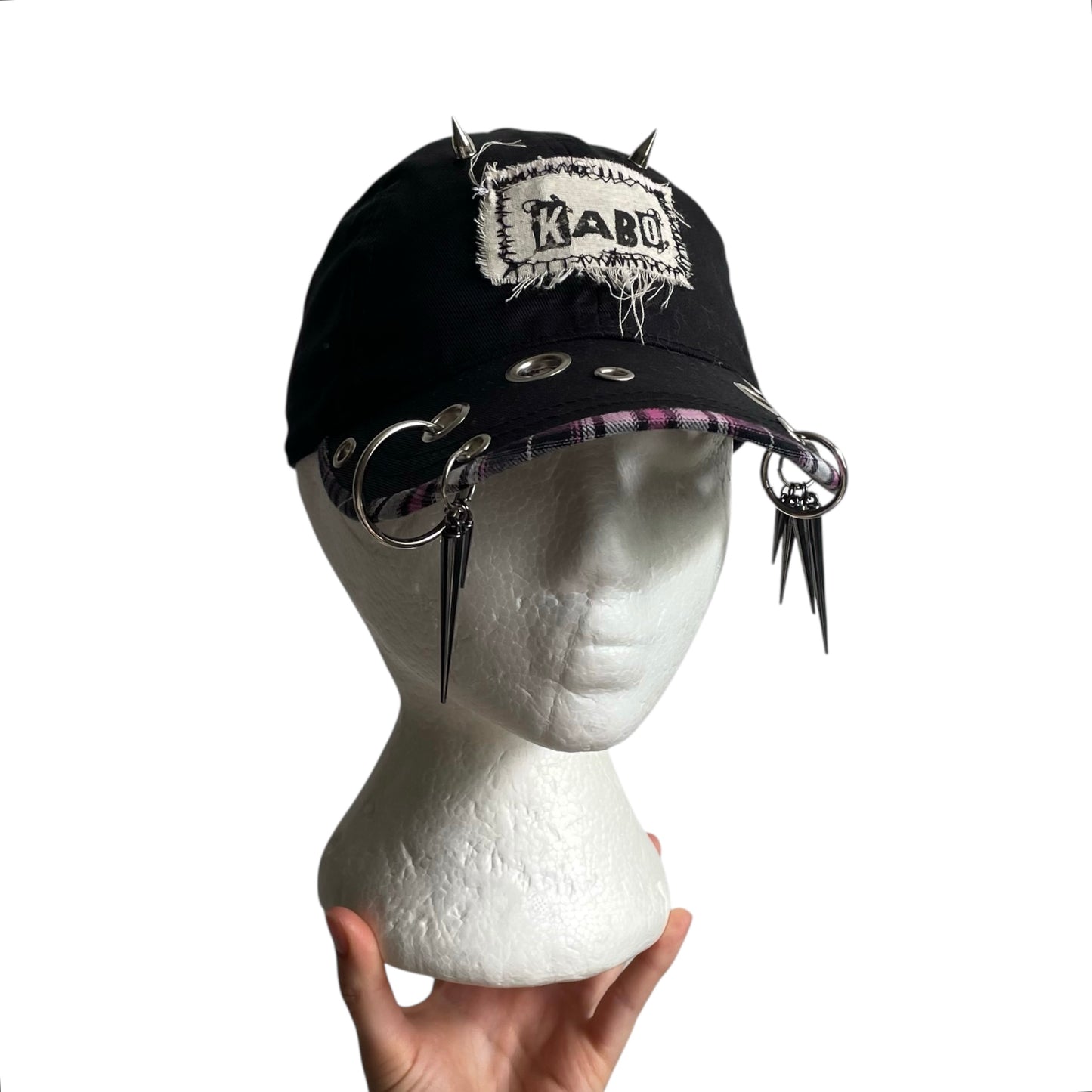 Spike charm cap