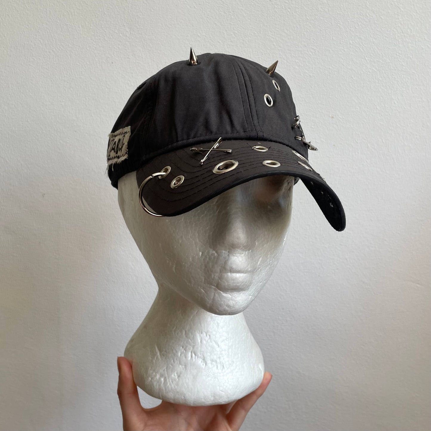 Grey eyelet cap