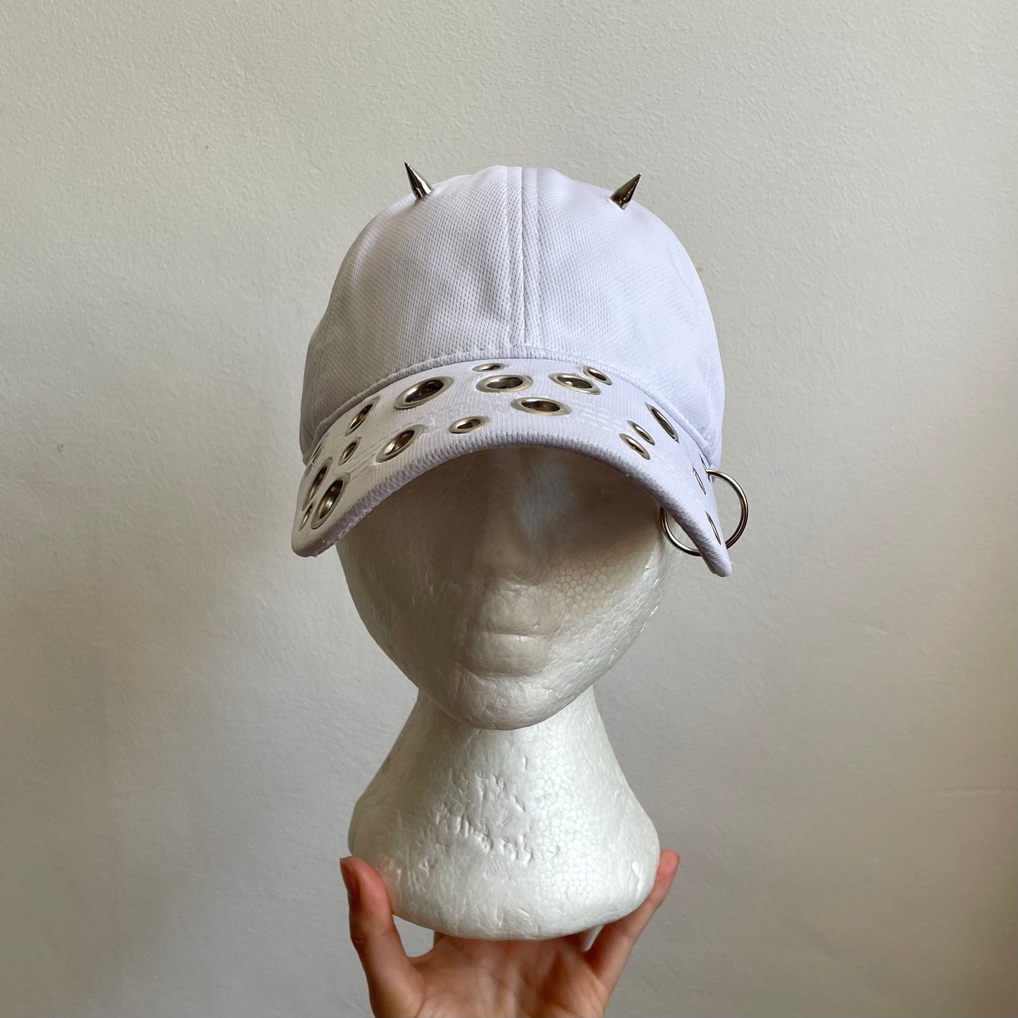 White eyelet cap