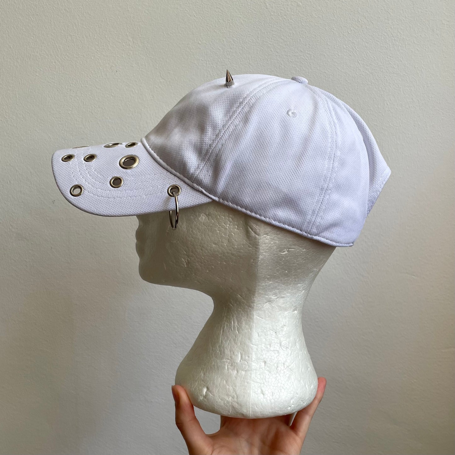 White eyelet cap
