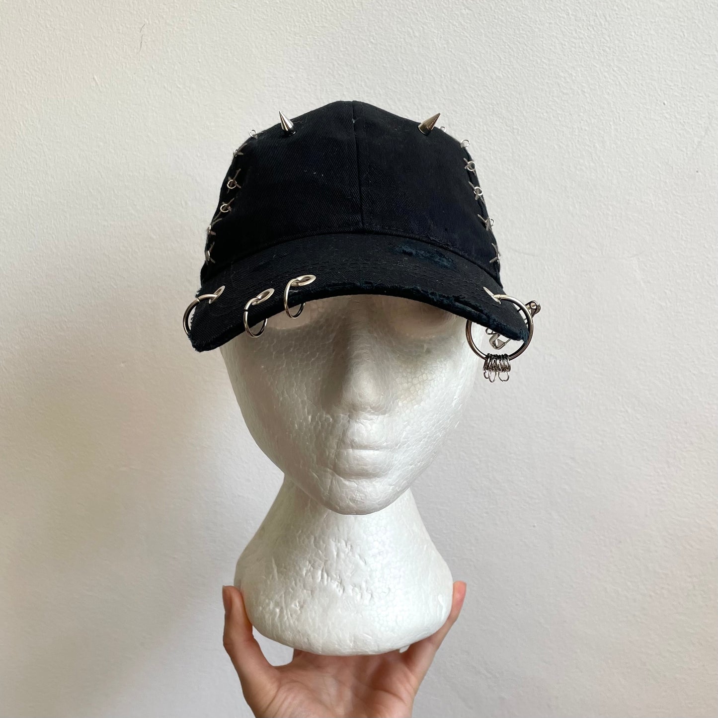 Black eyelet cap