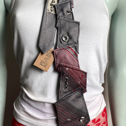 Grey disjointed tie