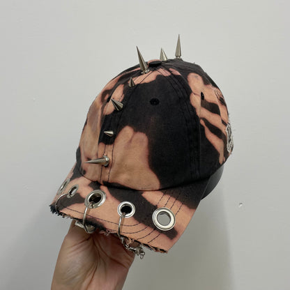 Spike + eyelet cap