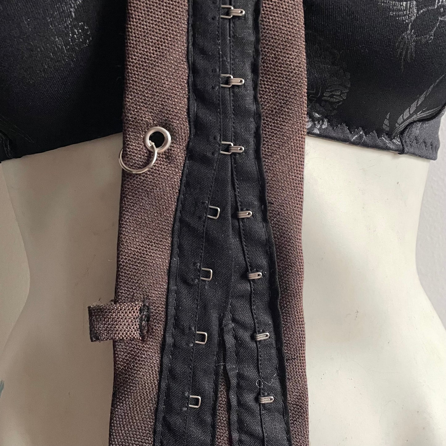 Brown hook + eye tie