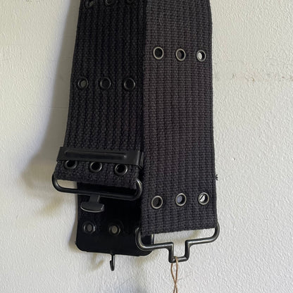 Triple eyelet belt