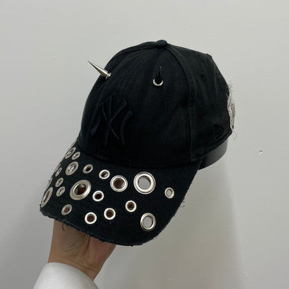 Eyelet brim cap
