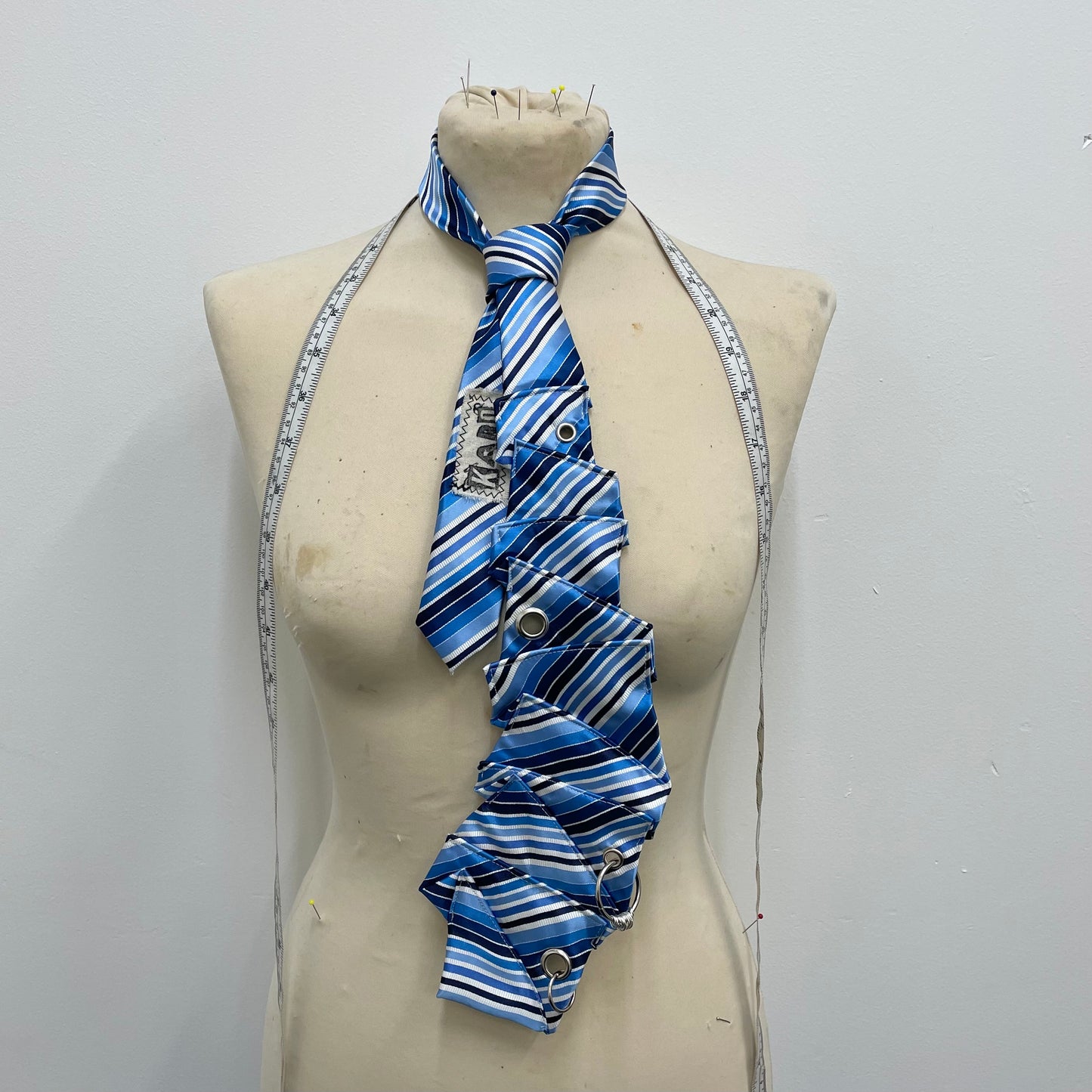 Blue disjointed tie