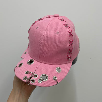 Pink cut out cap