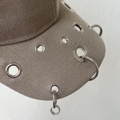 Beige eyelet cap