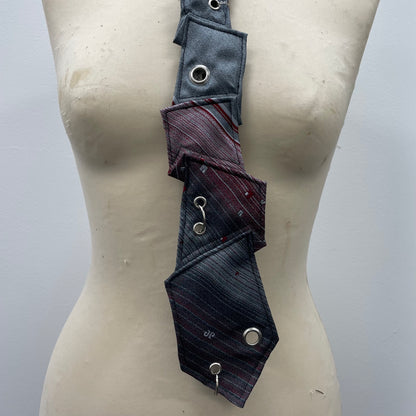Grey disjointed tie