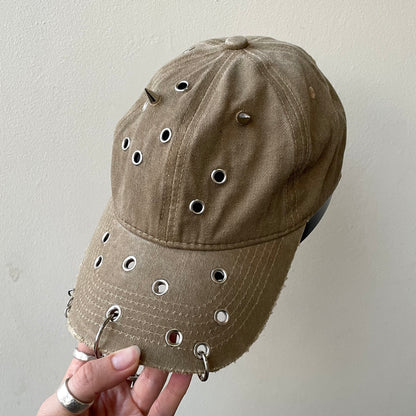 Beige eyelet cap