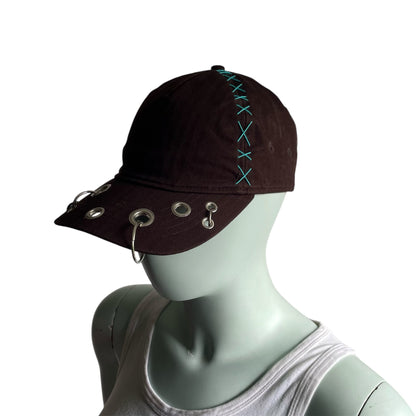Brown cross stitch cap